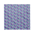 A blue bandana lying flat with a floral hydrangea pattern on it.