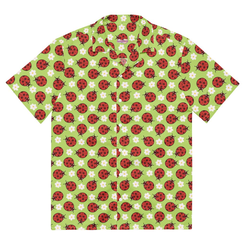 A green button up shirt with a floral ladybug pattern on it.