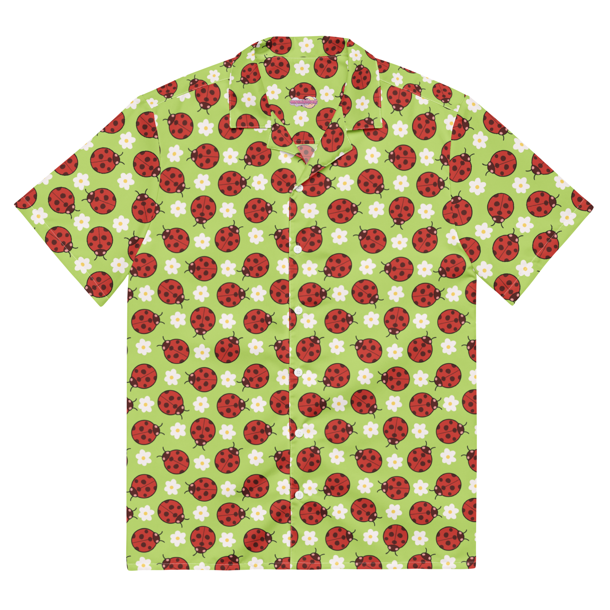 A green button up shirt with a floral ladybug pattern on it.