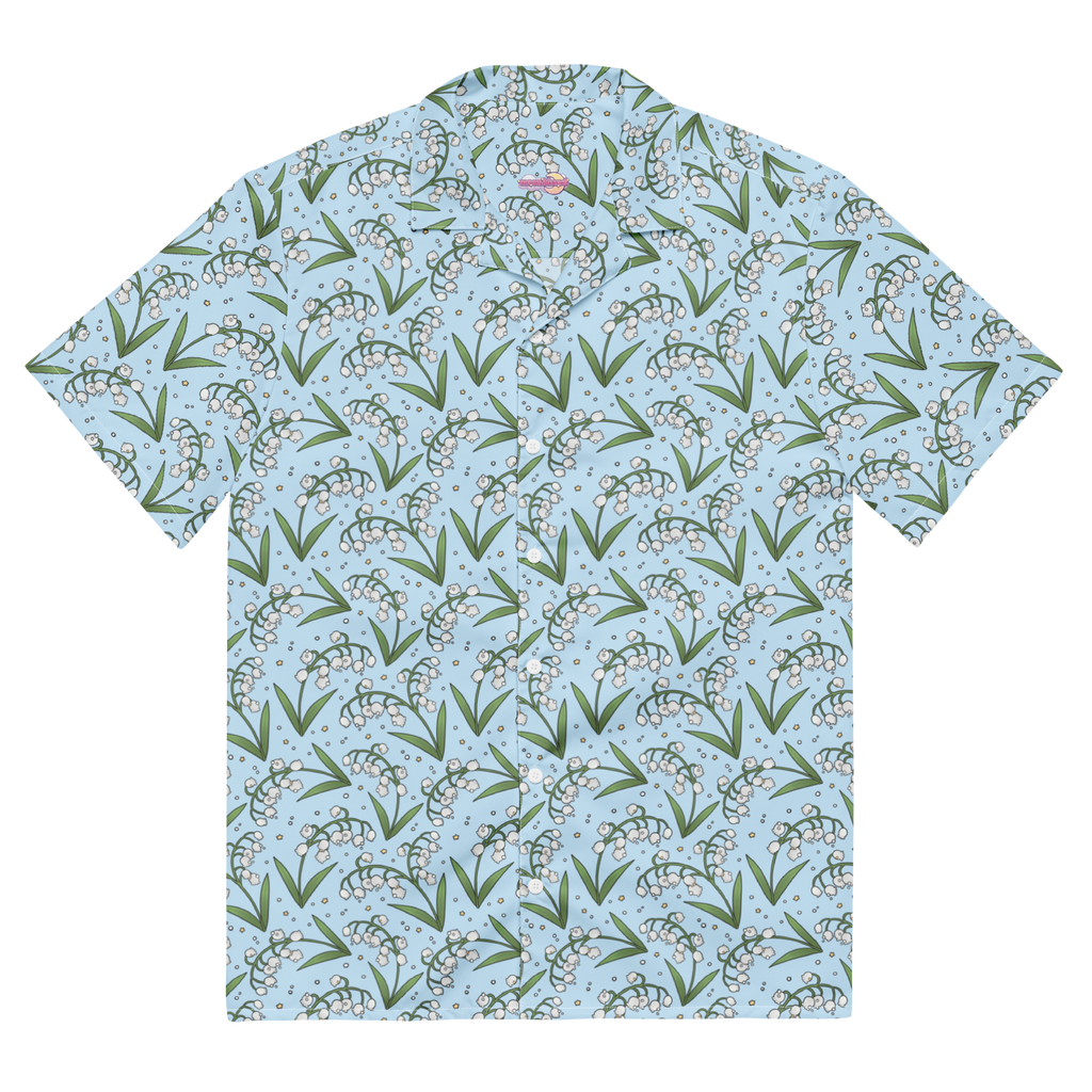 A light blue button up shirt with a floral lily of the valley pattern on it.