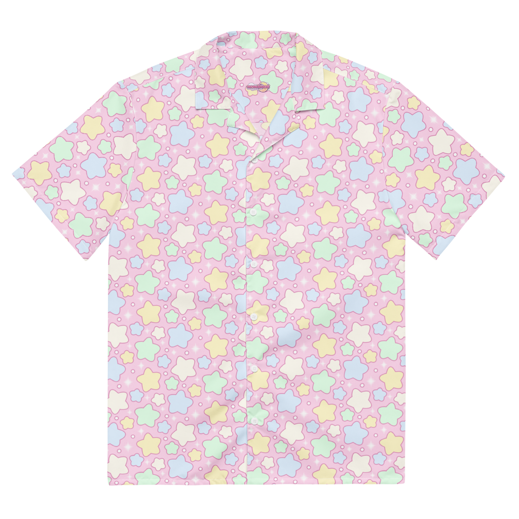 A pink button up shirt with a pastel rainbow star pattern on it.