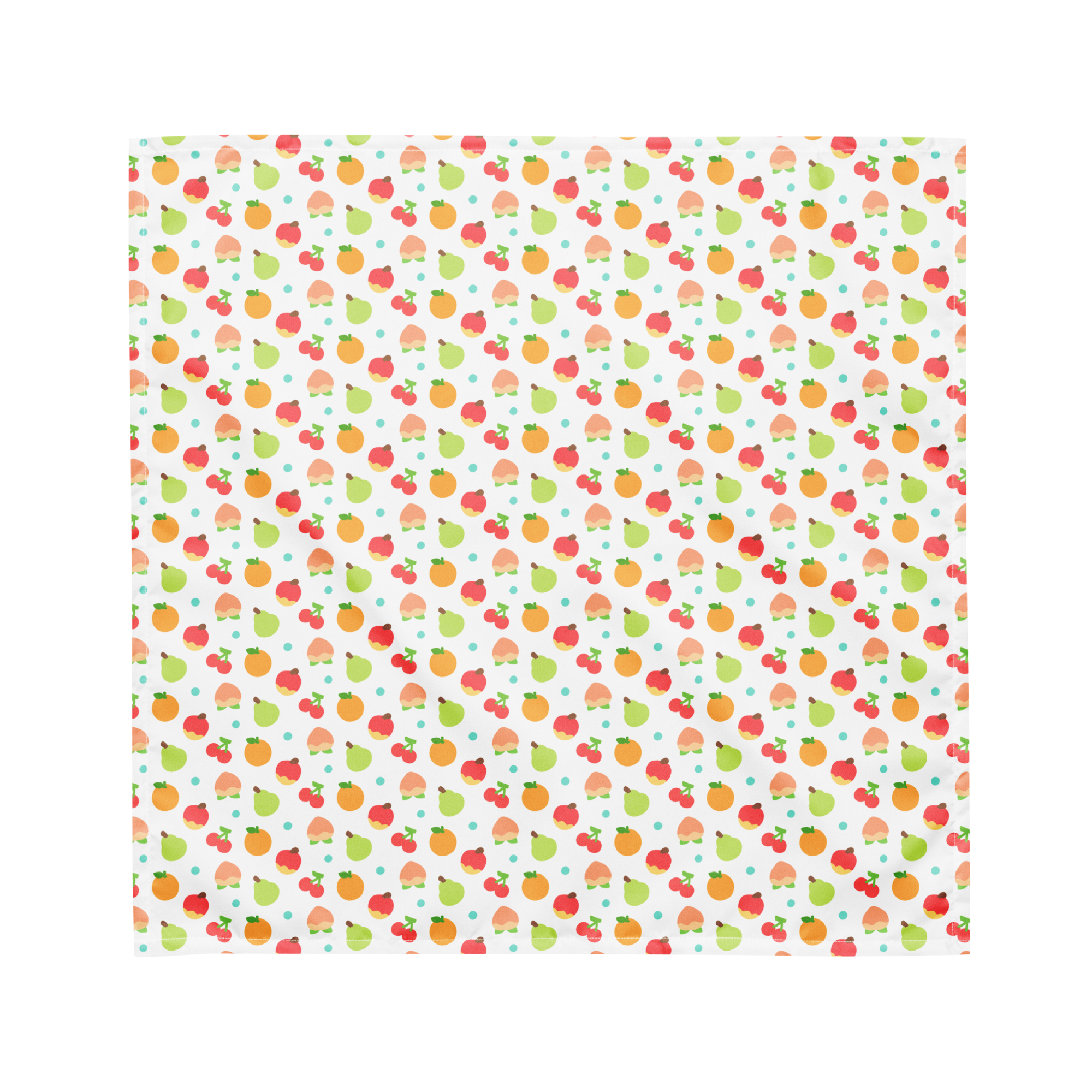 A white bandana lying flat with a colorful fruit pattern on it.