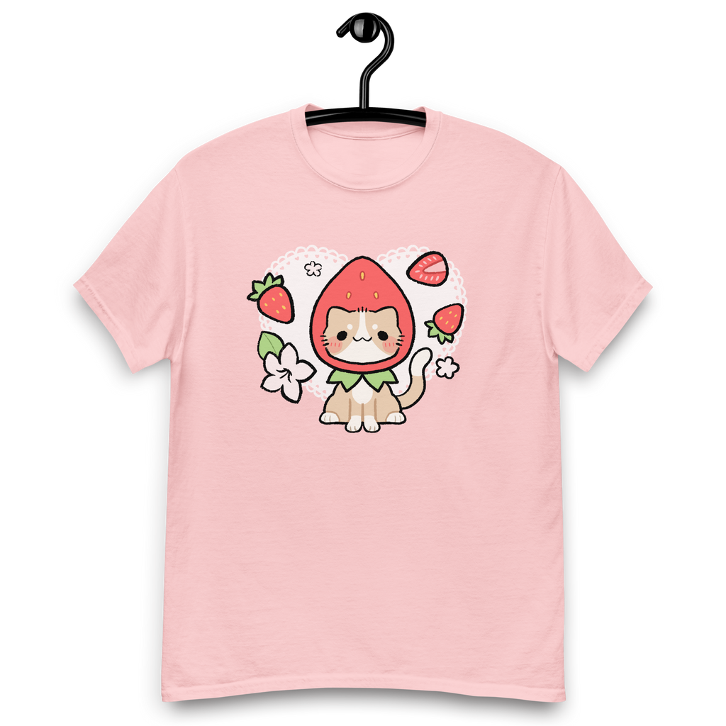 A cute pink shirt with a hand drawn illustration of a cat wearing a strawberry as a hat.