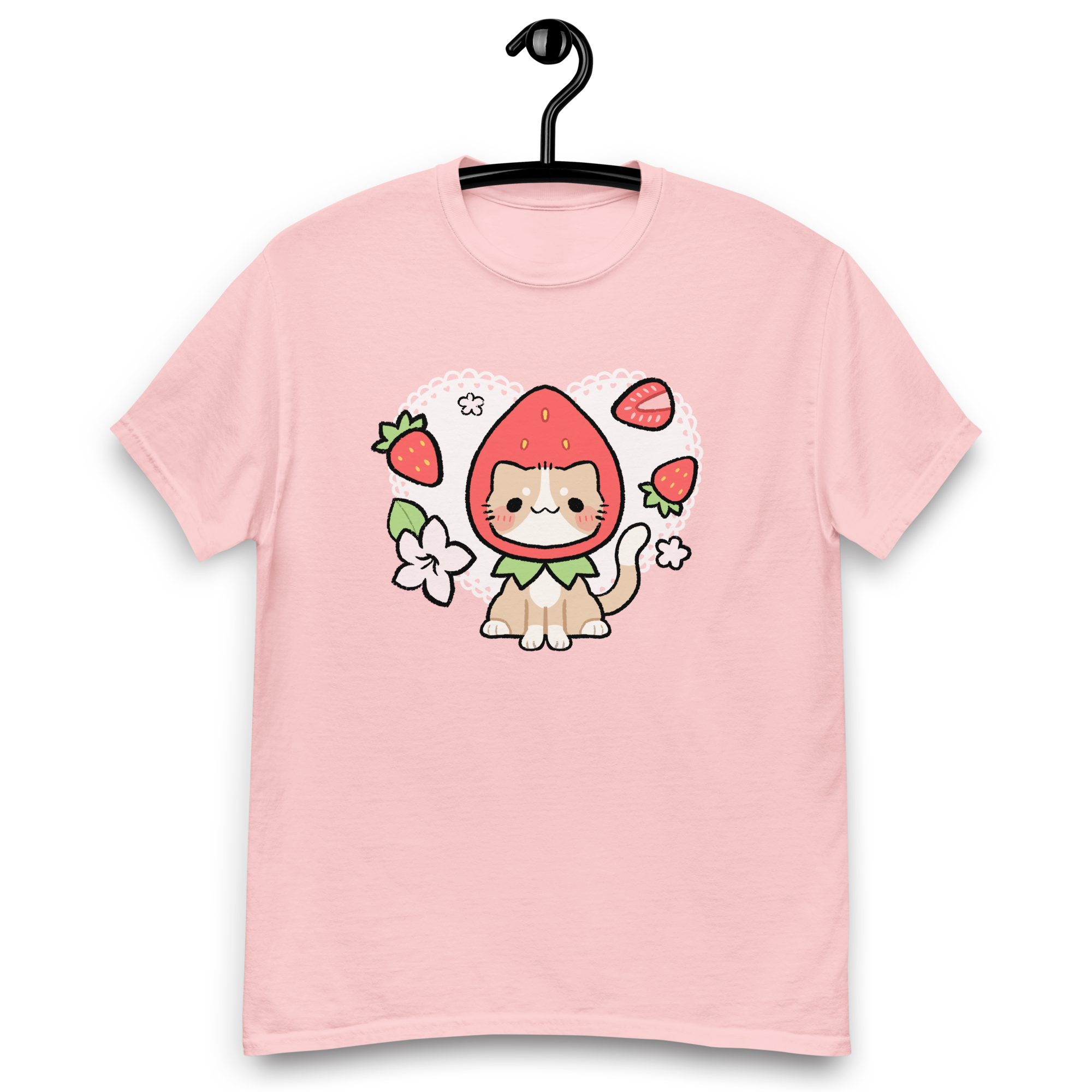 A cute pink shirt with a hand drawn illustration of a cat wearing a strawberry as a hat.