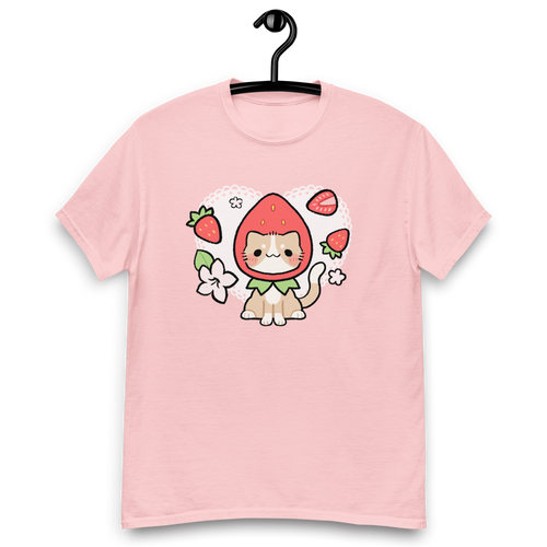 A cute pink shirt with a hand drawn illustration of a cat wearing a strawberry as a hat.