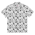 A white button up shirt with a a black pattern featuring hyenas, bones, paws, and text. 